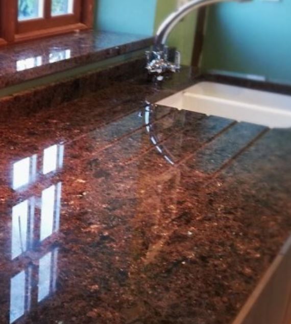 Đá granite nâu ngọc trai tím