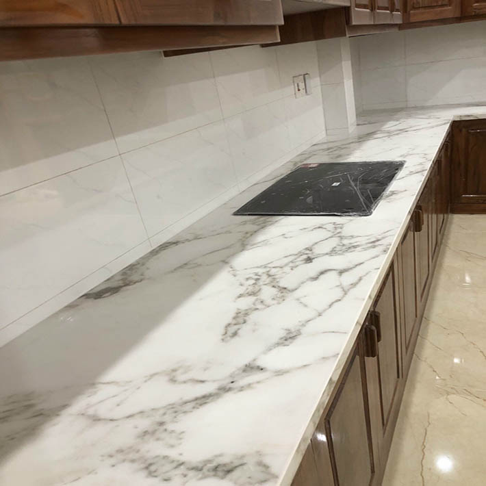 Giá đá hoa cương marble tự nhiên bếp màu trắng